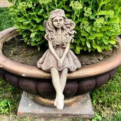 Садові фігури людей (жінки, чоловіки, діти)